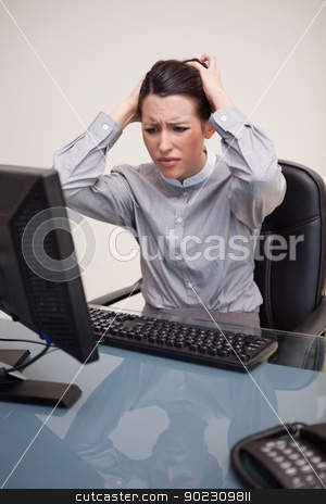 To use this stock image in your creative project, please select the size you need over to the right and click the "Add to Cart" button.
Your downloaded image will come with the Cutcaster watermark removed so don’t worry about the watermark you see on this page. Businesswoman having problems with her computer stock photo, Young businesswoman having problems with her computer by Wavebreak Media