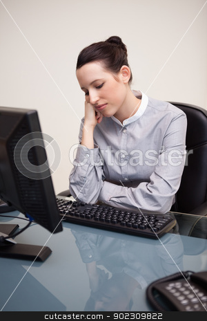 To use this stock image in your creative project, please select the size you need over to the right and click the "Add to Cart" button.
Your downloaded image will come with the Cutcaster watermark removed so don’t worry about the watermark you see on this page. Businesswoman sitting bored at her desk stock photo, Young businesswoman sitting bored at her desk by Wavebreak Media