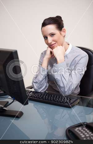 To use this stock image in your creative project, please select the size you need over to the right and click the "Add to Cart" button.
Your downloaded image will come with the Cutcaster watermark removed so don’t worry about the watermark you see on this page. Smiling businesswoman waiting patiently at her computer stock photo, Smiling young businesswoman waiting patiently at her computer by Wavebreak Media