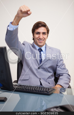 To use this stock image in your creative project, please select the size you need over to the right and click the "Add to Cart" button.
Your downloaded image will come with the Cutcaster watermark removed so don’t worry about the watermark you see on this page. Businessman raising his fist in success stock photo, Young businessman raising his fist in success by Wavebreak Media