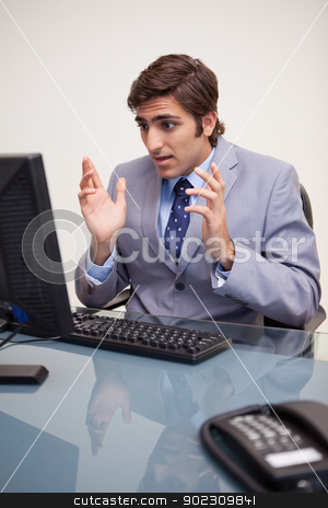 To use this stock image in your creative project, please select the size you need over to the right and click the "Add to Cart" button.
Your downloaded image will come with the Cutcaster watermark removed so don’t worry about the watermark you see on this page. Businessman getting surprised by his computer stock photo, Young businessman getting surprised by his computer by Wavebreak Media