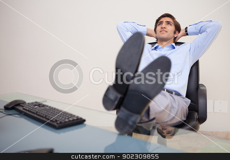 To use this stock image in your creative project, please select the size you need over to the right and click the "Add to Cart" button.
Your downloaded image will come with the Cutcaster watermark removed so don’t worry about the watermark you see on this page. Businessman leaning back in his chair stock photo, Young businessman leaning back in his chair by Wavebreak Media