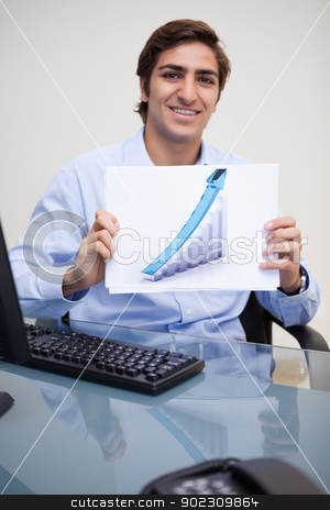 To use this stock image in your creative project, please select the size you need over to the right and click the "Add to Cart" button.
Your downloaded image will come with the Cutcaster watermark removed so don’t worry about the watermark you see on this page. Smiling businessman presenting good statistic stock photo, Smiling young businessman presenting good statistic by Wavebreak Media