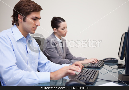To use this stock image in your creative project, please select the size you need over to the right and click the "Add to Cart" button.
Your downloaded image will come with the Cutcaster watermark removed so don’t worry about the watermark you see on this page. Side view of business team working next to each other stock photo, Side view of young business team working next to each other by Wavebreak Media