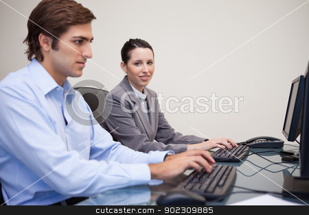 To use this stock image in your creative project, please select the size you need over to the right and click the "Add to Cart" button.
Your downloaded image will come with the Cutcaster watermark removed so don’t worry about the watermark you see on this page. Side view of business team working in their office stock photo, Side view of young business team working in their office by Wavebreak Media