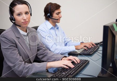 To use this stock image in your creative project, please select the size you need over to the right and click the "Add to Cart" button.
Your downloaded image will come with the Cutcaster watermark removed so don’t worry about the watermark you see on this page. Side view of working call center agents stock photo, Side view of working young call center agents by Wavebreak Media