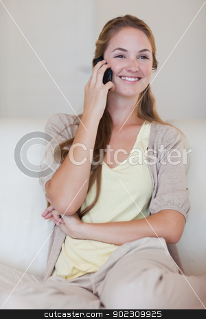 To use this stock image in your creative project, please select the size you need over to the right and click the "Add to Cart" button.
Your downloaded image will come with the Cutcaster watermark removed so don’t worry about the watermark you see on this page. Smiling woman listening to caller on her cellphone stock photo, Smiling young woman listening to caller on her cellphone by Wavebreak Media
