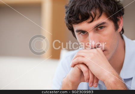 To use this stock image in your creative project, please select the size you need over to the right and click the "Add to Cart" button.
Your downloaded image will come with the Cutcaster watermark removed so don’t worry about the watermark you see on this page. Man in the living room in thoughts stock photo, Young man in the living room in thoughts by Wavebreak Media