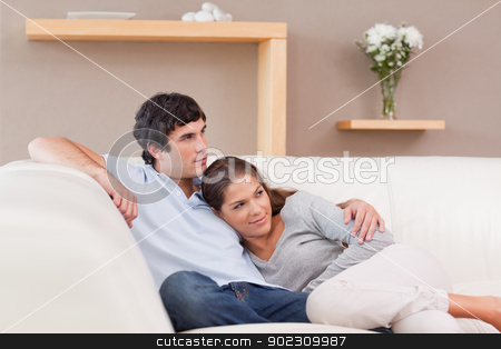 To use this stock image in your creative project, please select the size you need over to the right and click the "Add to Cart" button.
Your downloaded image will come with the Cutcaster watermark removed so don’t worry about the watermark you see on this page. Couple being together on the couch stock photo, Young couple being together on the couch by Wavebreak Media