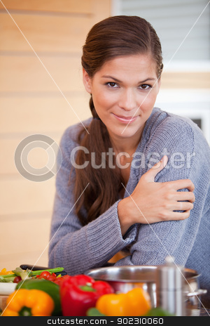 To use this stock image in your creative project, please select the size you need over to the right and click the "Add to Cart" button.
Your downloaded image will come with the Cutcaster watermark removed so don’t worry about the watermark you see on this page. Woman leaning against the kitchen counter stock photo, Young woman leaning against the kitchen counter by Wavebreak Media