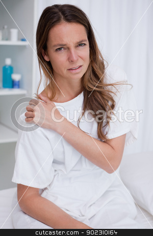 To use this stock image in your creative project, please select the size you need over to the right and click the "Add to Cart" button.
Your downloaded image will come with the Cutcaster watermark removed so don’t worry about the watermark you see on this page. Woman covering painful shoulder stock photo, Woman covering painful shoulder with her hand by Wavebreak Media