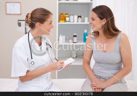 To use this stock image in your creative project, please select the size you need over to the right and click the "Add to Cart" button.
Your downloaded image will come with the Cutcaster watermark removed so don’t worry about the watermark you see on this page. Smiling doctor with patient stock photo, Smiling doctor with patient in examination room by Wavebreak Media