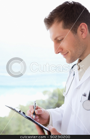 To use this stock image in your creative project, please select the size you need over to the right and click the "Add to Cart" button.
Your downloaded image will come with the Cutcaster watermark removed so don’t worry about the watermark you see on this page. Side view of doctor taking notes stock photo, Side view of young doctor taking notes by Wavebreak Media