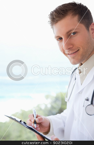 To use this stock image in your creative project, please select the size you need over to the right and click the "Add to Cart" button.
Your downloaded image will come with the Cutcaster watermark removed so don’t worry about the watermark you see on this page. Side view of doctor with clipboard stock photo, Side view of doctor with pen and clipboard by Wavebreak Media