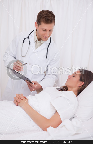 To use this stock image in your creative project, please select the size you need over to the right and click the "Add to Cart" button.
Your downloaded image will come with the Cutcaster watermark removed so don’t worry about the watermark you see on this page. Doctor standing next to patient stock photo, Doctor standing next to bedridden patient by Wavebreak Media