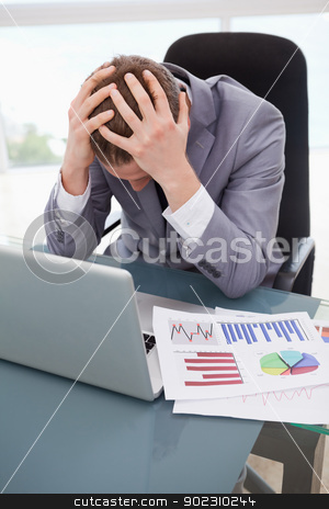 To use this stock image in your creative project, please select the size you need over to the right and click the "Add to Cart" button.
Your downloaded image will come with the Cutcaster watermark removed so don’t worry about the watermark you see on this page. Businessman frustrated by statistics stock photo, Businessman at his desk frustrated by statistics by Wavebreak Media
