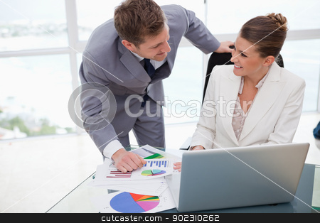 To use this stock image in your creative project, please select the size you need over to the right and click the "Add to Cart" button.
Your downloaded image will come with the Cutcaster watermark removed so don’t worry about the watermark you see on this page. Business team analyzing poll results stock photo, Business team analyzing poll results together by Wavebreak Media