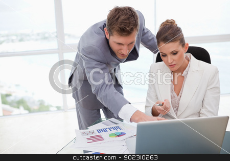 To use this stock image in your creative project, please select the size you need over to the right and click the "Add to Cart" button.
Your downloaded image will come with the Cutcaster watermark removed so don’t worry about the watermark you see on this page. Business team working on poll results stock photo, Business team working on poll results together by Wavebreak Media