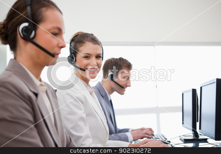To use this stock image in your creative project, please select the size you need over to the right and click the "Add to Cart" button.
Your downloaded image will come with the Cutcaster watermark removed so don’t worry about the watermark you see on this page. Side view of telephone service office employees stock photo, Side view of telephone service office employees at work by Wavebreak Media