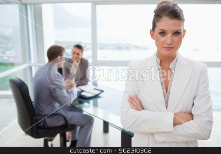 To use this stock image in your creative project, please select the size you need over to the right and click the "Add to Cart" button.
Your downloaded image will come with the Cutcaster watermark removed so don’t worry about the watermark you see on this page. Marketing manager standing with arms folded stock photo, Marketing manager standing with arms folded and her team sitting behind her by Wavebreak Media