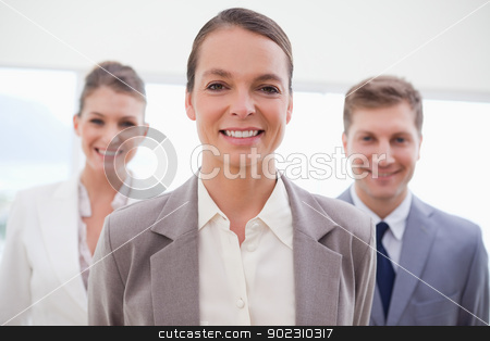To use this stock image in your creative project, please select the size you need over to the right and click the "Add to Cart" button.
Your downloaded image will come with the Cutcaster watermark removed so don’t worry about the watermark you see on this page. Business consultant with her team behind her stock photo, Business consultant standing with her team behind her by Wavebreak Media