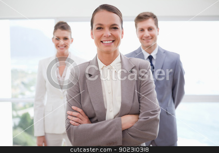 To use this stock image in your creative project, please select the size you need over to the right and click the "Add to Cart" button.
Your downloaded image will come with the Cutcaster watermark removed so don’t worry about the watermark you see on this page. Business consultant with arms folded stock photo, Business consultant with arms folded and her team by Wavebreak Media