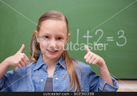 To use this stock image in your creative project, please select the size you need over to the right and click the "Add to Cart" button.
Your downloaded image will come with the Cutcaster watermark removed so don’t worry about the watermark you see on this page. Schoolgirl with the thumbs up stock photo, Schoolgirl with the thumbs up in front of a backboard by Wavebreak Media