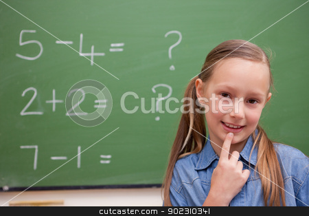 To use this stock image in your creative project, please select the size you need over to the right and click the "Add to Cart" button.
Your downloaded image will come with the Cutcaster watermark removed so don’t worry about the watermark you see on this page. Cute schoolgirl thinking stock photo, Cute schoolgirl thinking in front of a blackboard by Wavebreak Media