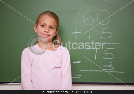 To use this stock image in your creative project, please select the size you need over to the right and click the "Add to Cart" button.
Your downloaded image will come with the Cutcaster watermark removed so don’t worry about the watermark you see on this page. Girl standing up stock photo, Girl standing up in front a blackboard by Wavebreak Media