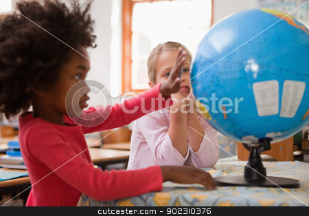 To use this stock image in your creative project, please select the size you need over to the right and click the "Add to Cart" button.
Your downloaded image will come with the Cutcaster watermark removed so don’t worry about the watermark you see on this page. Happy schoolgirls looking at a globe stock photo, Happy schoolgirls looking at a globe in a classroom by Wavebreak Media