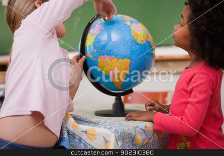 To use this stock image in your creative project, please select the size you need over to the right and click the "Add to Cart" button.
Your downloaded image will come with the Cutcaster watermark removed so don’t worry about the watermark you see on this page. Cute little schoolgirls looking at a globe stock photo, Cute little schoolgirls looking at a globe in a classroom by Wavebreak Media