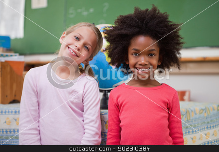 To use this stock image in your creative project, please select the size you need over to the right and click the "Add to Cart" button.
Your downloaded image will come with the Cutcaster watermark removed so don’t worry about the watermark you see on this page. Cute schoolgirls posing stock photo, Cute schoolgirls posing in a classroom by Wavebreak Media