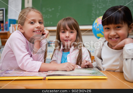 To use this stock image in your creative project, please select the size you need over to the right and click the "Add to Cart" button.
Your downloaded image will come with the Cutcaster watermark removed so don’t worry about the watermark you see on this page. Happy schoolgirls reading a fairy tale to their classmate stock photo, Happy schoolgirls reading a fairy tale to their classmate while looking at the camera by Wavebreak Media