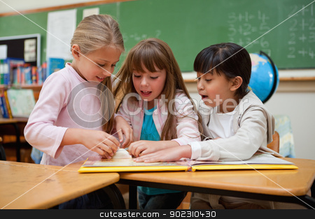 To use this stock image in your creative project, please select the size you need over to the right and click the "Add to Cart" button.
Your downloaded image will come with the Cutcaster watermark removed so don’t worry about the watermark you see on this page. Little schoolgirls reading a fairy tale stock photo, Little schoolgirls reading a fairy tale in a classroom by Wavebreak Media