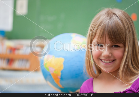 To use this stock image in your creative project, please select the size you need over to the right and click the "Add to Cart" button.
Your downloaded image will come with the Cutcaster watermark removed so don’t worry about the watermark you see on this page. Schoolgirl posing in front of a globe stock photo, Schoolgirl posing in front of a globe in a classroom by Wavebreak Media