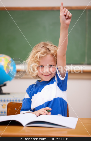 To use this stock image in your creative project, please select the size you need over to the right and click the "Add to Cart" button.
Your downloaded image will come with the Cutcaster watermark removed so don’t worry about the watermark you see on this page. Portrait of a schoolboy raising his hand stock photo, Portrait of a schoolboy raising his hand in a classroom by Wavebreak Media