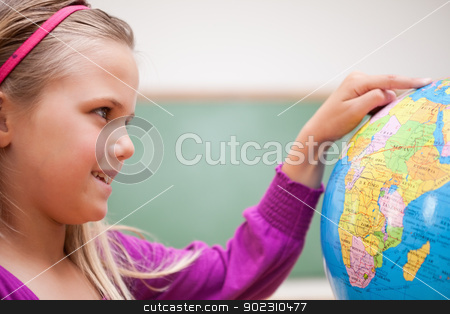 To use this stock image in your creative project, please select the size you need over to the right and click the "Add to Cart" button.
Your downloaded image will come with the Cutcaster watermark removed so don’t worry about the watermark you see on this page. Close up of a cute schoolgirl looking at a globe stock photo, Close up of a cute schoolgirl looking at a globe in a classroom by Wavebreak Media
