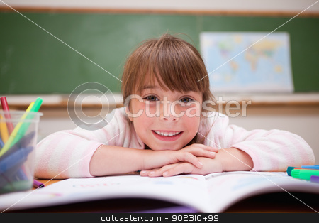 To use this stock image in your creative project, please select the size you need over to the right and click the "Add to Cart" button.
Your downloaded image will come with the Cutcaster watermark removed so don’t worry about the watermark you see on this page. Happy schoolgirl leaning on a desk stock photo, Happy schoolgirl leaning on a desk in classroom by Wavebreak Media