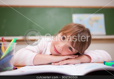 To use this stock image in your creative project, please select the size you need over to the right and click the "Add to Cart" button.
Your downloaded image will come with the Cutcaster watermark removed so don’t worry about the watermark you see on this page. Cute schoolgirl leaning on a desk stock photo, Cute schoolgirl leaning on a desk in a classroom by Wavebreak Media