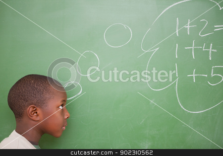To use this stock image in your creative project, please select the size you need over to the right and click the "Add to Cart" button.
Your downloaded image will come with the Cutcaster watermark removed so don’t worry about the watermark you see on this page. Schoolboy thinking about additions stock photo, Schoolboy thinking about additions in front of a blackboard by Wavebreak Media