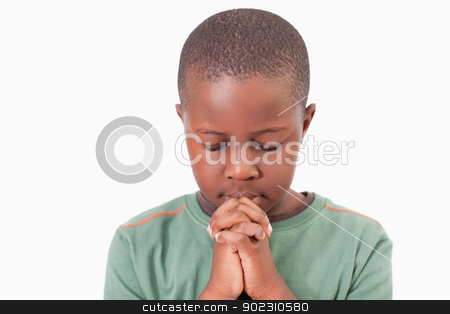 To use this stock image in your creative project, please select the size you need over to the right and click the "Add to Cart" button.
Your downloaded image will come with the Cutcaster watermark removed so don’t worry about the watermark you see on this page. Young boy praying stock photo, Young boy praying against a white background by Wavebreak Media
