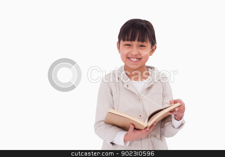 To use this stock image in your creative project, please select the size you need over to the right and click the "Add to Cart" button.
Your downloaded image will come with the Cutcaster watermark removed so don’t worry about the watermark you see on this page. Smiling girl reading a book stock photo, Smiling girl reading a book against a white background by Wavebreak Media