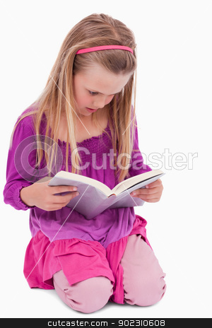 To use this stock image in your creative project, please select the size you need over to the right and click the "Add to Cart" button.
Your downloaded image will come with the Cutcaster watermark removed so don’t worry about the watermark you see on this page. Portrait of a girl reading a book stock photo, Portrait of a girl reading a book against a white background by Wavebreak Media