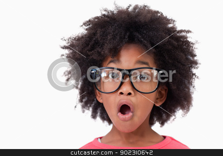 To use this stock image in your creative project, please select the size you need over to the right and click the "Add to Cart" button.
Your downloaded image will come with the Cutcaster watermark removed so don’t worry about the watermark you see on this page. Close up of a shocked smart girl stock photo, Close up of a shocked smart girl against a white background by Wavebreak Media