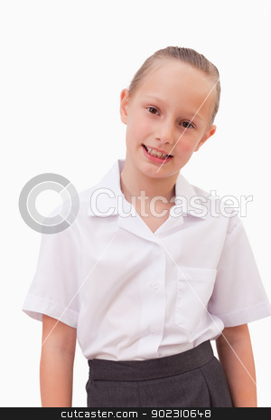 To use this stock image in your creative project, please select the size you need over to the right and click the "Add to Cart" button.
Your downloaded image will come with the Cutcaster watermark removed so don’t worry about the watermark you see on this page. Portrait of a serious girl smiling stock photo, Portrait of a serious girl smiling against a white background by Wavebreak Media