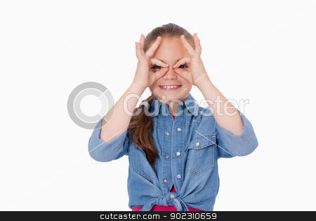 To use this stock image in your creative project, please select the size you need over to the right and click the "Add to Cart" button.
Your downloaded image will come with the Cutcaster watermark removed so don’t worry about the watermark you see on this page. Girl with her fingers around her eyes stock photo, Girl with her fingers around her eyes against a white background by Wavebreak Media