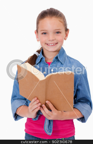 To use this stock image in your creative project, please select the size you need over to the right and click the "Add to Cart" button.
Your downloaded image will come with the Cutcaster watermark removed so don’t worry about the watermark you see on this page. Portrait of a smart girl reading a book stock photo, Portrait of a smart girl reading a book against a white background by Wavebreak Media
