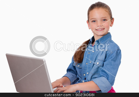 To use this stock image in your creative project, please select the size you need over to the right and click the "Add to Cart" button.
Your downloaded image will come with the Cutcaster watermark removed so don’t worry about the watermark you see on this page. Happy girl using a notebook stock photo, Happy girl using a notebook against a white background by Wavebreak Media