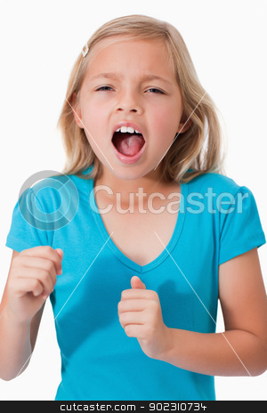 To use this stock image in your creative project, please select the size you need over to the right and click the "Add to Cart" button.
Your downloaded image will come with the Cutcaster watermark removed so don’t worry about the watermark you see on this page. Portrait of a young girl screaming stock photo, Portrait of a young girl screaming against a white background by Wavebreak Media