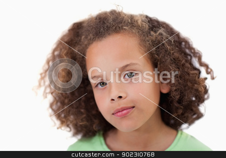 To use this stock image in your creative project, please select the size you need over to the right and click the "Add to Cart" button.
Your downloaded image will come with the Cutcaster watermark removed so don’t worry about the watermark you see on this page. Close up of a girl looking at the camera stock photo, Close up of a girl looking at the camera against a white background by Wavebreak Media